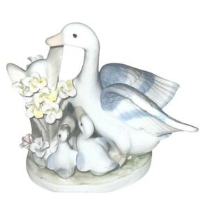 Porcelain Mother Duck and Ducklings Figurine with Floral Detail